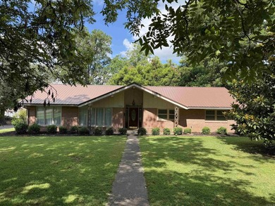This stunning, re-modeled home nestled on a quiet corner lot in - photo 1