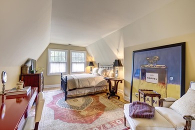 Welcome to 7 Cedar Lane, a remarkable turnkey residence perched - photo 40