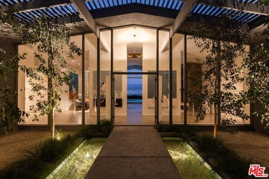Tucked in an exclusive pocket of the Hollywood Hills, this - photo 3