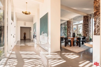 Tucked in an exclusive pocket of the Hollywood Hills, this - photo 10
