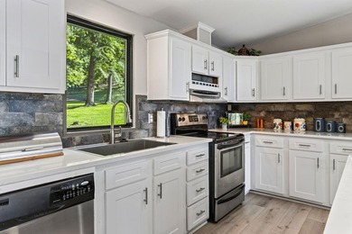 Discover the beauty of waterfront living on Lake Pinkston in - photo 11