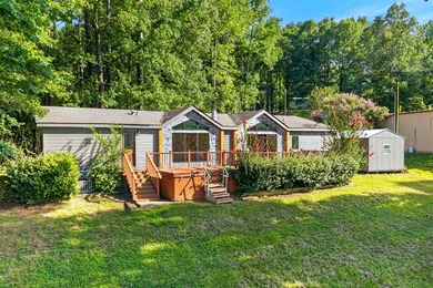 Discover the beauty of waterfront living on Lake Pinkston in - photo 28