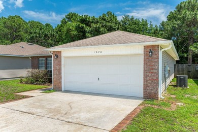 Welcome to coastal living in Navarre! This beautiful 3-bedroom - photo 35