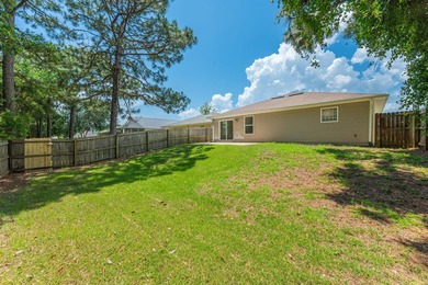 Welcome to coastal living in Navarre! This beautiful 3-bedroom - photo 39
