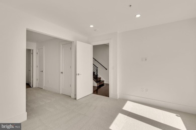 Experience elevated living in this exceptional four-level - photo 5