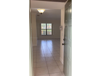 INVESTORS OPPORTUNITY! Ground-floor, corner 3BR/2BA condo in