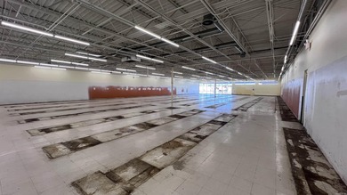 Prime 9,664 SF end cap retail suite available in a high-traffic