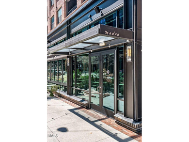 Experience elevated downtown living from this beautifully - photo 44