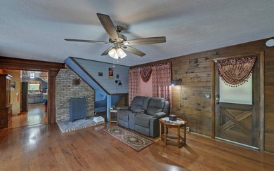 Wake up where the river is the main event. This true log cabin - photo 4