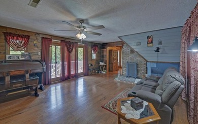Wake up where the river is the main event. This true log cabin - photo 5