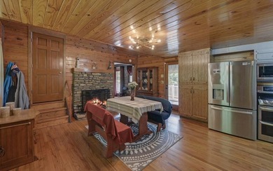 Wake up where the river is the main event. This true log cabin - photo 7