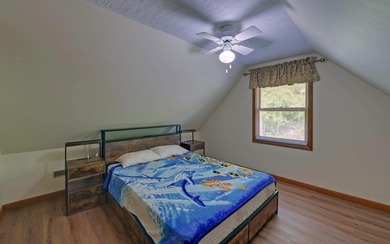 Wake up where the river is the main event. This true log cabin - photo 9
