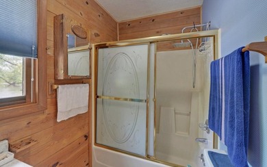 Wake up where the river is the main event. This true log cabin - photo 10