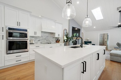 Welcome to an extraordinary, fully renovated estate in the - photo 9