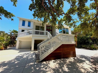 Rare bayfront acreage with deeded Gulf beach access on Manasota - photo 3