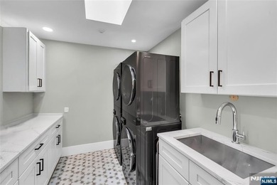 Built in 2023, this stunning custom Colonial Farm House offers - photo 29