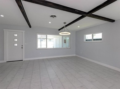 One or more photo(s) has been virtually staged. Island living at - photo 8