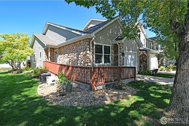 CHECK OUT THIS PRICE IMPROVEMENT ON updated townhome. This end