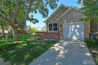 CHECK OUT THIS PRICE IMPROVEMENT ON updated townhome. This end