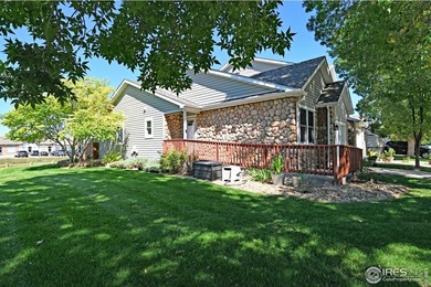 CHECK OUT THIS PRICE IMPROVEMENT ON updated townhome. This end