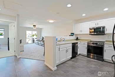 CHECK OUT THIS PRICE IMPROVEMENT ON updated townhome. This end