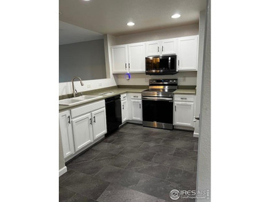 CHECK OUT THIS PRICE IMPROVEMENT ON updated townhome. This end