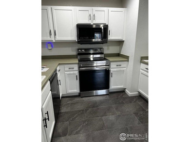 CHECK OUT THIS PRICE IMPROVEMENT ON updated townhome. This end