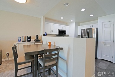 CHECK OUT THIS PRICE IMPROVEMENT ON updated townhome. This end