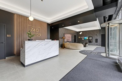 Experience elevated city living in this well-maintained - photo 12