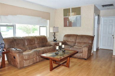 Nestled on a spacious corner lot, this charming 4 bedroom/2 - photo 4
