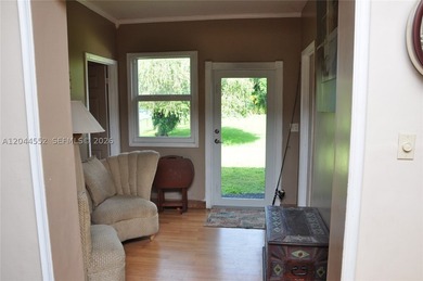 Nestled on a spacious corner lot, this charming 4 bedroom/2 - photo 9