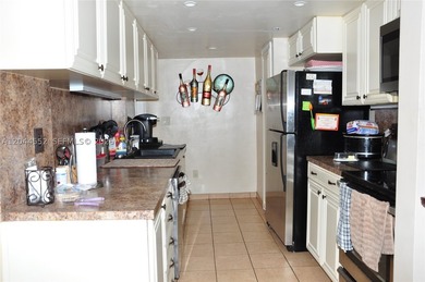 Nestled on a spacious corner lot, this charming 4 bedroom/2 - photo 10