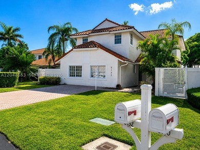 Experience the ultimate Doral lifestyle in this stunning 5BR/3BA - photo 1