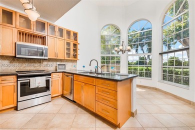 Experience the ultimate Doral lifestyle in this stunning 5BR/3BA - photo 5