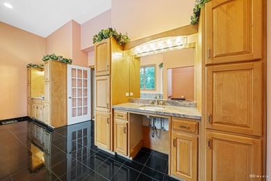 This one-of-a-kind, customized home is located in the sought - photo 31