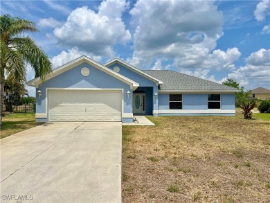 Lake Home For Sale in Lehigh Acres, Florida