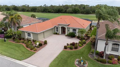 Virtually Staged. SPECTACULAR GOLF & LAKE VIEWS! 3 BR/2BA/3-CAR - photo 2