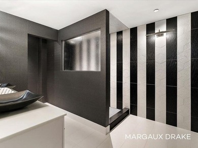 Above the city on the 32nd floor of The River House, one of - photo 50