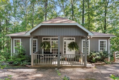 Hidden among the trees in peaceful Shady Grove Acres, this - photo 1