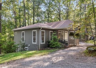 Hidden among the trees in peaceful Shady Grove Acres, this - photo 2