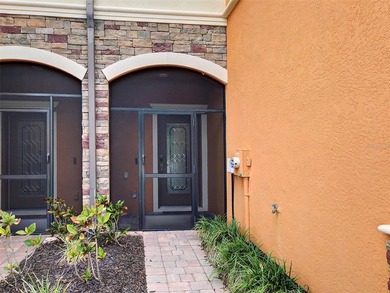 Luxury townhome with water view located in the gated - photo 3