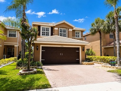 Welcome to this beautifully maintained 4-bedroom, 2.5-bathroom - photo 1