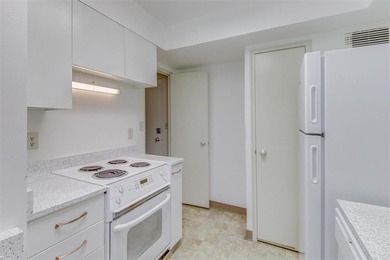 This is the one! Oak Hall Condominium Unit 106 is conveniently