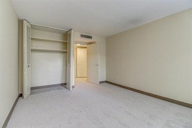 This is the one! Oak Hall Condominium Unit 106 is conveniently