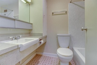 This is the one! Oak Hall Condominium Unit 106 is conveniently