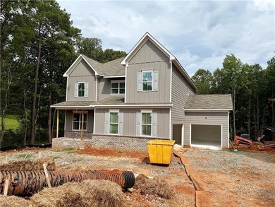 Traton Homes, Dunning elevation *C* on a basement with a 3- car - photo 45