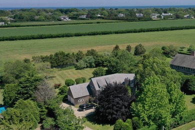 Nestled in the coveted enclave of Bridgehampton South, just - photo 1