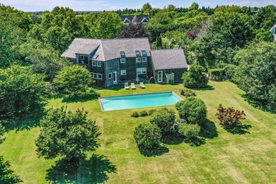 Nestled in the coveted enclave of Bridgehampton South, just - photo 2