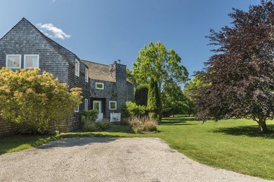 Nestled in the coveted enclave of Bridgehampton South, just - photo 3