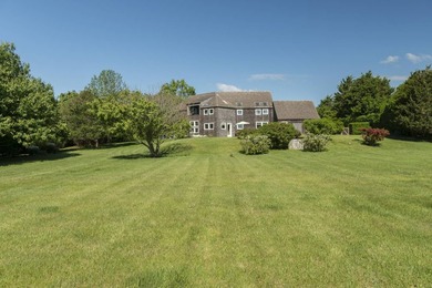 Nestled in the coveted enclave of Bridgehampton South, just - photo 4
